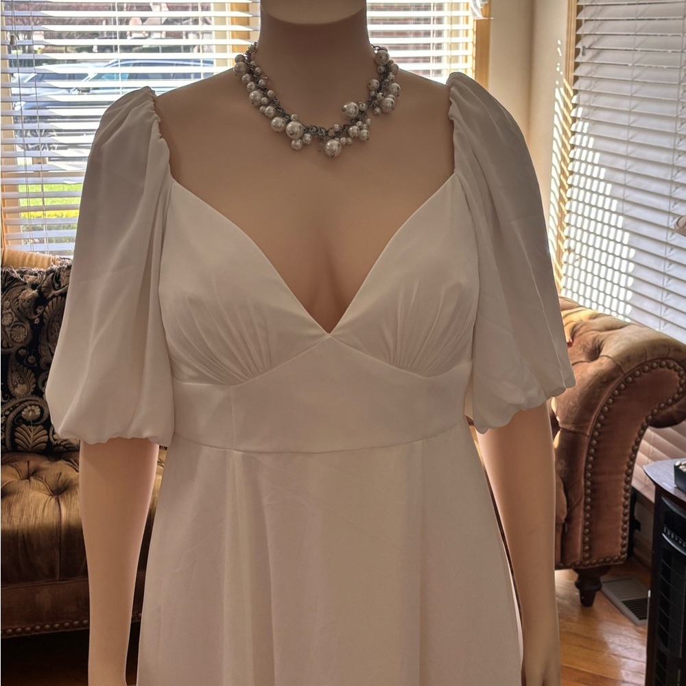 DB STUDIO
Bubble Sleeve Georgette V-Neck Wedding Dress
STYLE# SDWG0971. Size 16w - Picture 5 of 16